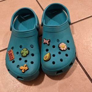 Teal Crocs men's 7/ women's 9